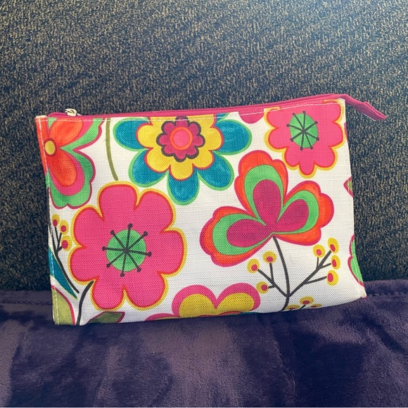 Clinique Handbags - Clinique floral make up bag